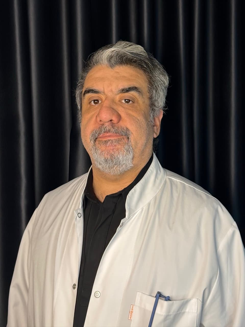 Dr. Ersan Cenan